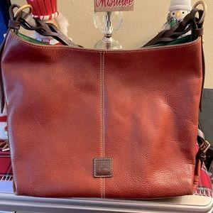 Authentic Dooney & Bourke Florentine Leather Twist Sac shoulder bag in Ginger